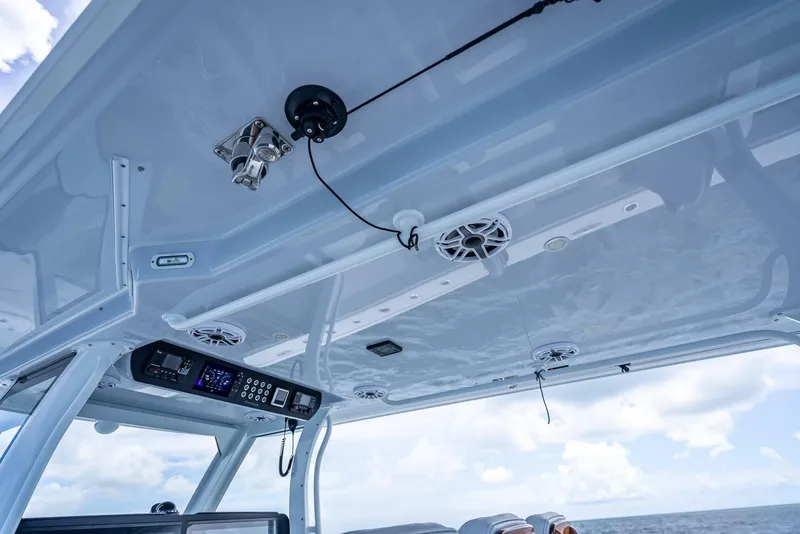 Slide: The Image of Freeman 43 boat interior, 2023 model, featuring advanced audio system and sleek design. - 34