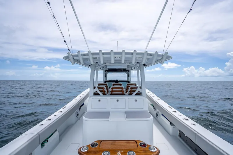 Slide: The Image of 2023 Freeman 43 boat on open sea under cloudy sky. - 38