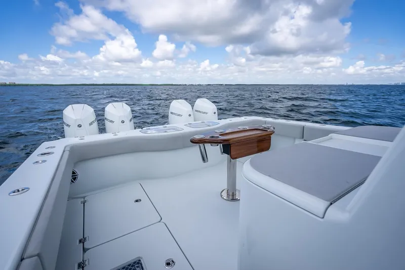 Slide: The Image of Freeman 43 boat deck with four engines, ocean view, 2023 model. - 46