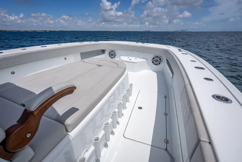 Slide: The Image of Freeman 43 boat interior, 2023 model, featuring spacious seating and ocean view. - 48