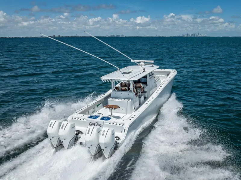Slide: The Image of Freeman 43 boat cruising on open water, 2023 model, with powerful engines. - 5