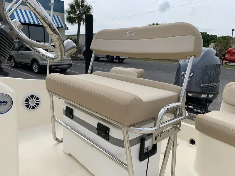 Slide: The Image of 2025 Scout 175 Sportfish boat seat with beige upholstery and stainless steel frame. - 9