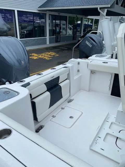 Slide: The Image of 2026 Tidewater 232cc LXF boat interior with Yamaha engine, featuring spacious seating and storage. - 6
