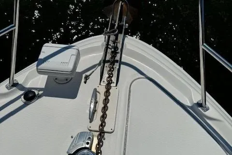 Slide: The Image of Bow of 2002 Sea Ray 410 Sundancer with anchor chain and deck equipment. - 12