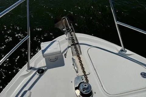 Slide: The Image of Bow of 2002 Sea Ray 410 Sundancer with anchor and chain mechanism. - 13