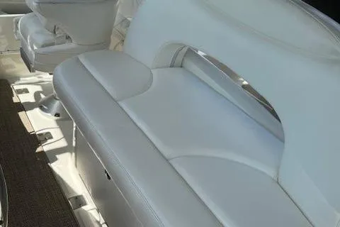 Slide: The Image of White leather seating on 2002 Sea Ray 410 Sundancer boat. - 23