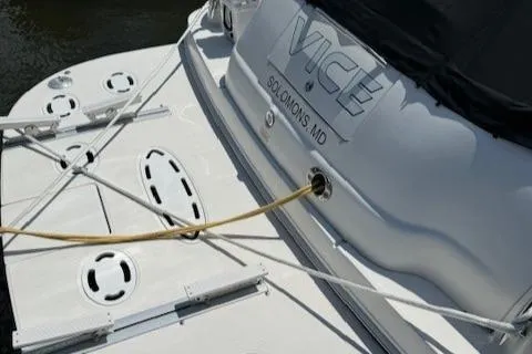 Slide: The Image of Rear view of 2002 Sea Ray 410 Sundancer boat docked in Solomons, MD. - 6