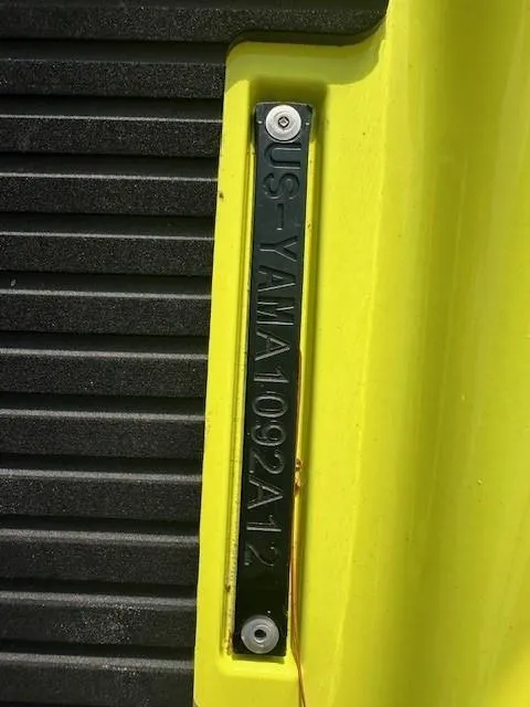 Slide: The Image of 2021 Yamaha WaveRunner VX Limited identification plate on yellow body. - 8