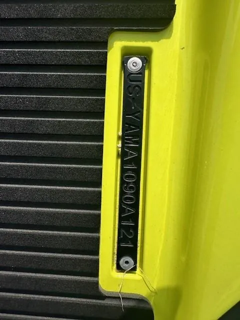 Slide: The Image of 2021 Yamaha WaveRunner VX Limited, yellow hull with serial number plate. - 9