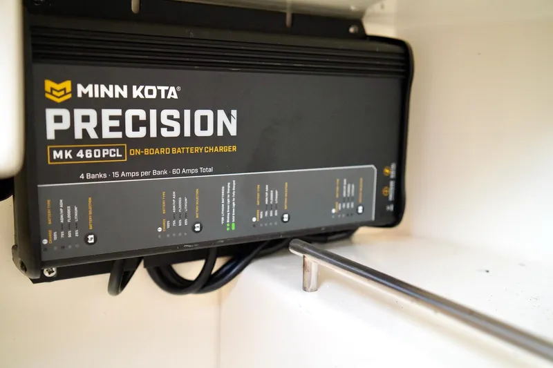 Slide: The Image of Minn Kota Precision MK 460PCL on-board battery charger in 2009 Scout 282 Sportfish. - 22