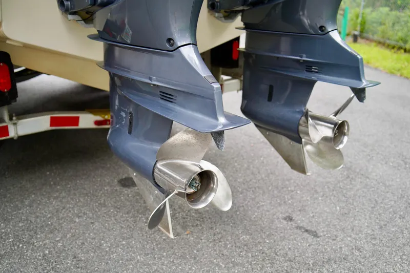 Slide: The Image of Twin outboard motors on a 2009 Scout 282 Sportfish boat. - 27