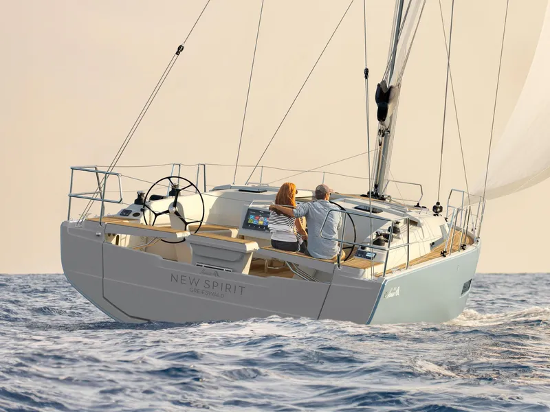 Slide: The Image of 2025 Hanse 360 sailboat on open sea, two people enjoying the voyage. - 26