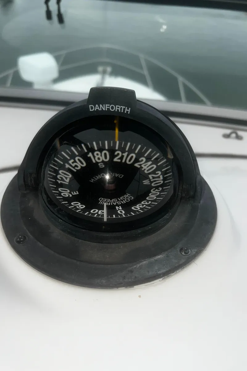 Slide: The Image of Compass on 2001 Bayliner 3788 Command Bridge Motoryacht, showing heading direction. - 16