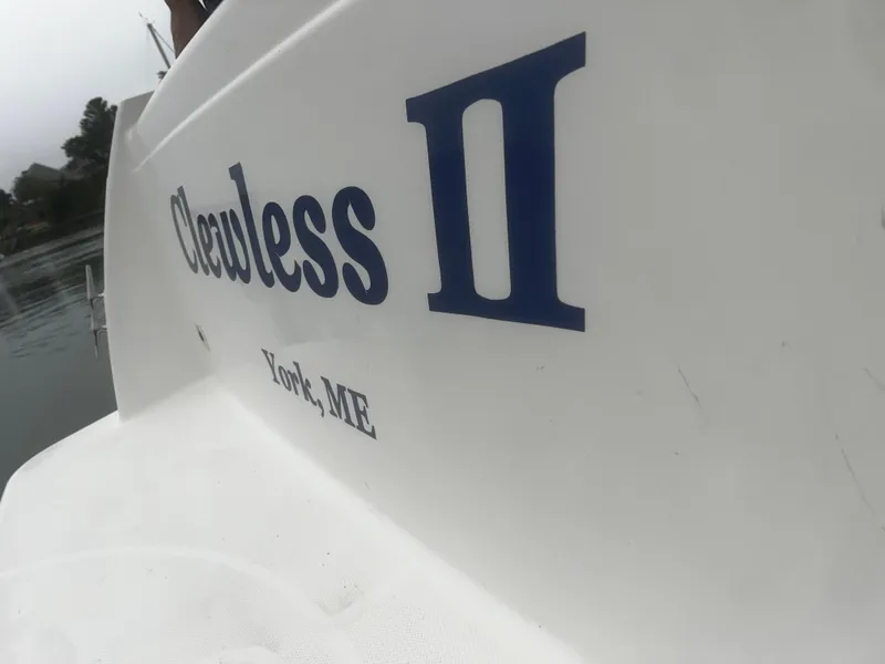 Slide: The Image of Bayliner 3788 Command Bridge Motoryacht 2001, named "Clueless II," docked in York, ME. - 47