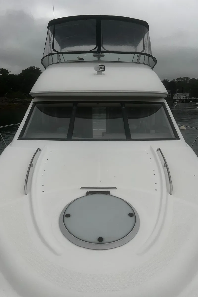 Slide: The Image of 2001 Bayliner 3788 Command Bridge Motoryacht with sleek design and spacious deck. - 6