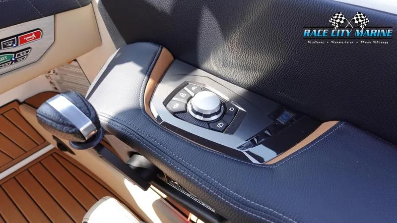 Slide: The Image of 2022 Nautique Super Air G23 control console with controls. - 16