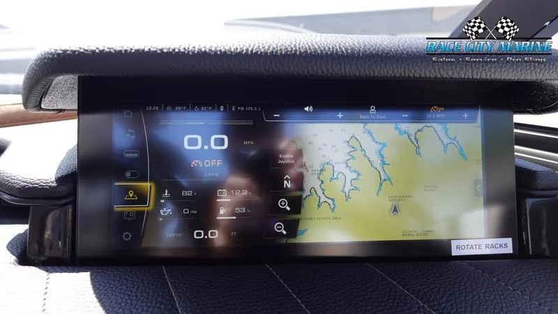 Slide: The Image of 2022 Nautique Super Air G23 display with navigation map. - 17
