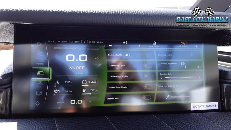 Slide: The Image of 2022 Nautique Super Air G23 touchscreen display with control options. - 19