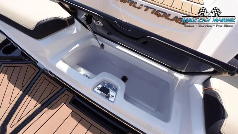 Slide: The Image of Storage compartment in 2022 Nautique Super Air Nautique G23 boat. - 28