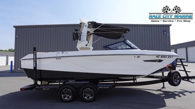 Slide: The Image of 2022 Nautique Super Air Nautique G23 on trailer, side view. - 40
