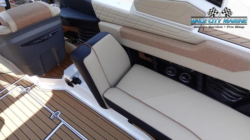 Slide: The Image of Interior of 2022 Nautique Super Air Nautique G23 with luxurious seating. - 48