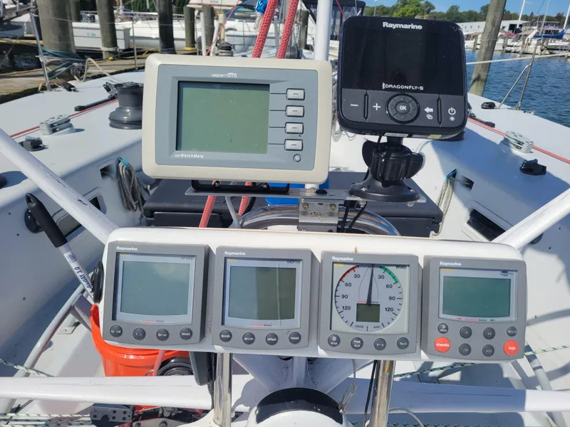 Slide: The Image of Cockpit of a 1990 Nelson Marek IOR 50 Racing Sailboat with navigation instruments. - 6