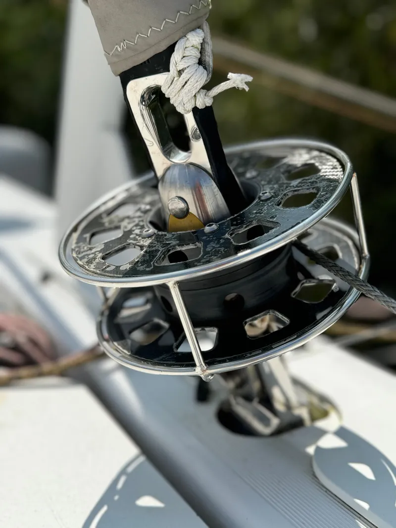 Slide: The Image of Close-up of a 2010 Outremer 49 sailboat winch mechanism on deck. - 30