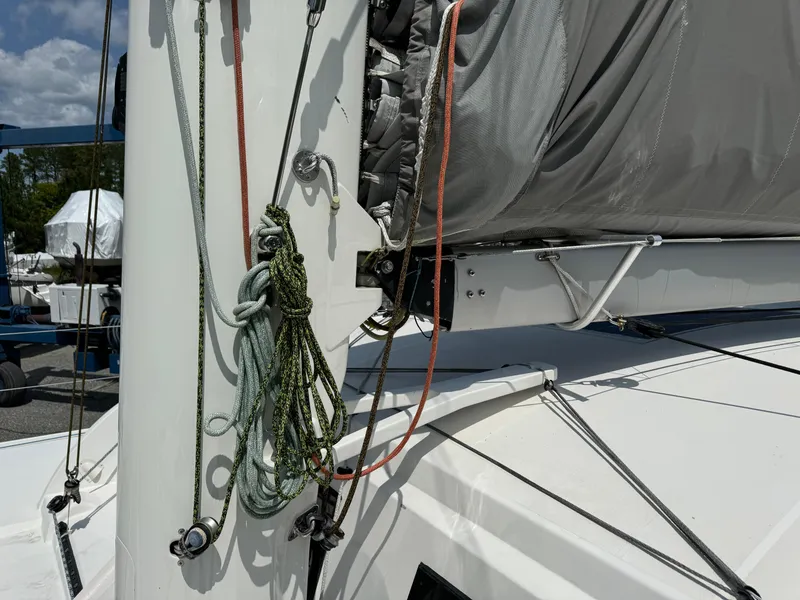 Slide: The Image of Outremer 49 sailboat mast and rigging, 2010 model, with ropes and sail cover. - 33