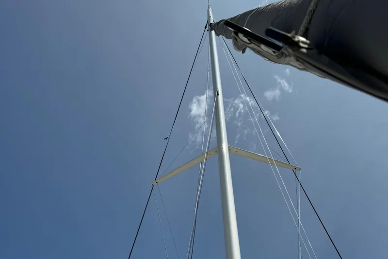 Slide: The Image of Mast of 2010 Outremer 49 sailboat against clear blue sky. - 45