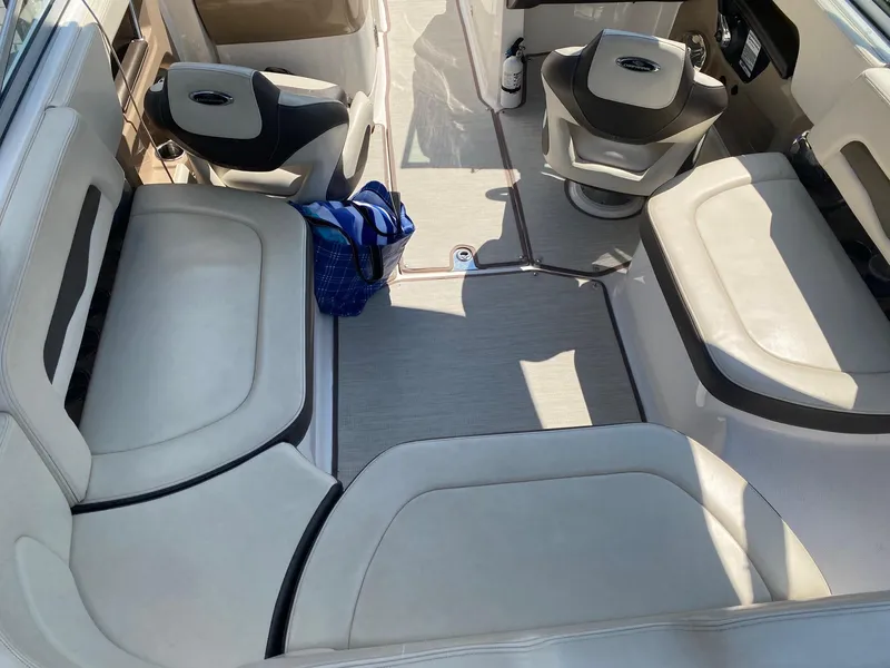 Slide: The Image of Interior of 2019 Chaparral 246 SSi boat with spacious seating and modern design. - 6