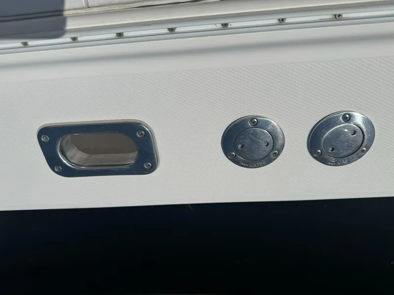 Slide: The Image of Close-up of a 2009 Regulator 32 Forward Seating boat fittings and fixtures. - 17