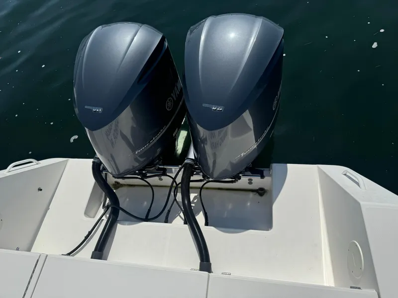 Slide: The Image of Twin Yamaha outboard engines on a 2009 Regulator 32 Forward Seating boat. - 49
