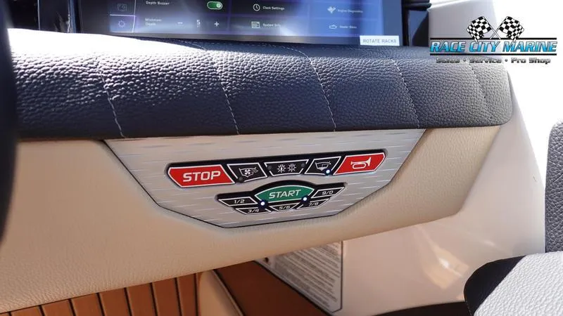 Slide: The Image of 2022 Nautique Super Air Nautique G23 dashboard with start and stop controls. - 31