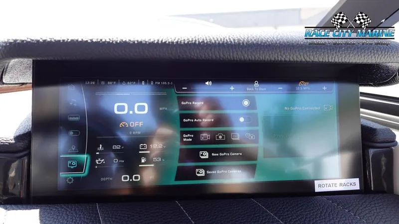Slide: The Image of 2022 Nautique Super Air Nautique G23 dashboard display with digital controls and settings. - 37
