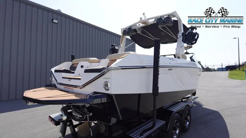 Slide: The Image of 2022 Nautique Super Air Nautique G23 boat on trailer at Race City Marine. - 7