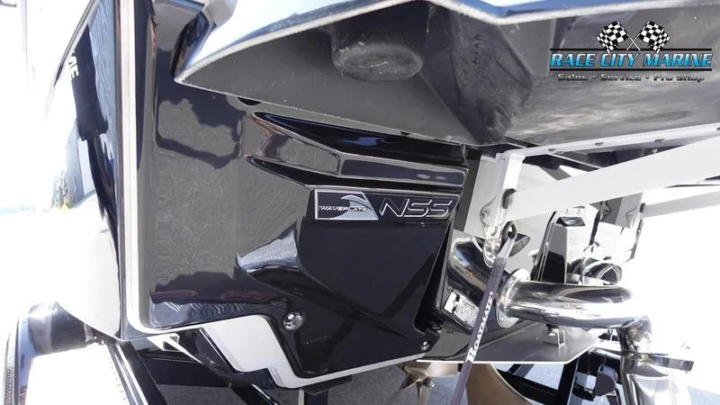Slide: The Image of 2022 Nautique Super Air Nautique G23 boat rear view with NSS system. - 9