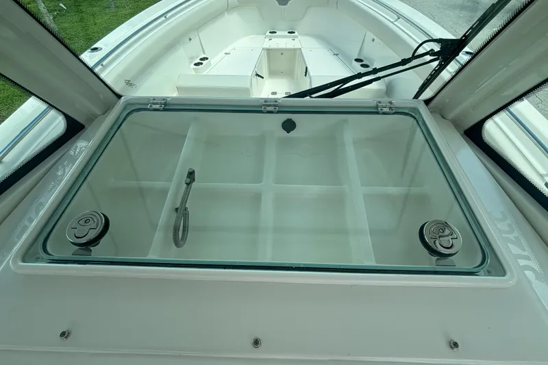 Slide: The Image of 2025 Sailfish 312 CC boat with glass compartment and spacious deck. - 25