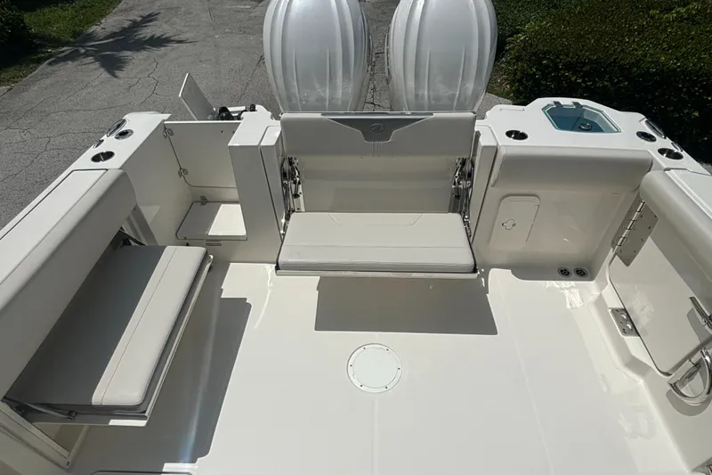 Slide: The Image of 2025 Sailfish 312 CC boat interior with seating and storage compartments. - 30