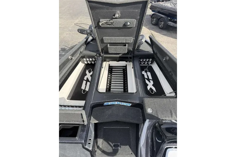 Slide: The Image of 2018 Skeeter FX20 Limited Edition boat interior with open storage compartments. - 9