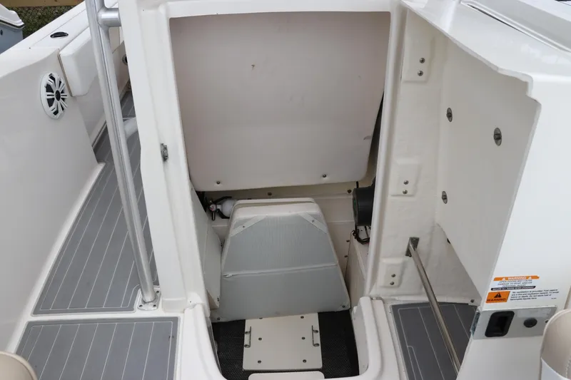 Slide: The Image of 2018 Robalo R202 Explorer boat interior storage compartment. - 8