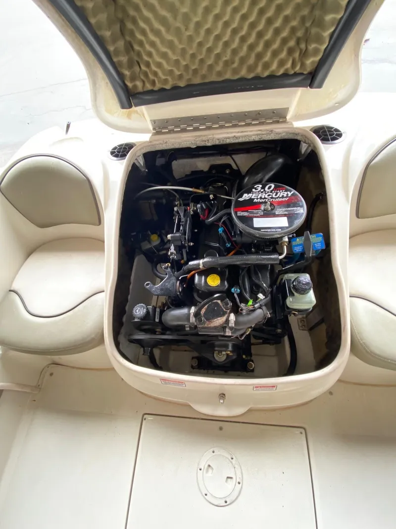 Slide: The Image of Engine compartment of a 2005 Sea Ray 180 Sport boat with Mercury 3.0 engine. - 4