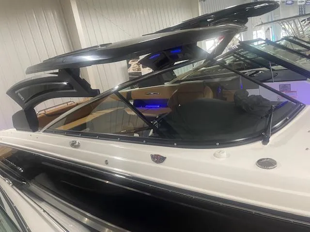 Slide: The Image of 2025 Chaparral 30 Surf boat with sleek design and modern features. - 18