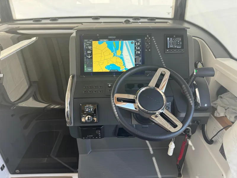 Slide: The Image of 2024 Nimbus Commuter 9 dashboard with navigation display and steering wheel. - 7