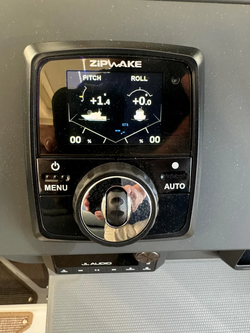 Slide: The Image of 2024 Nimbus Commuter 9 Zipwake control panel displaying pitch and roll settings. - 8