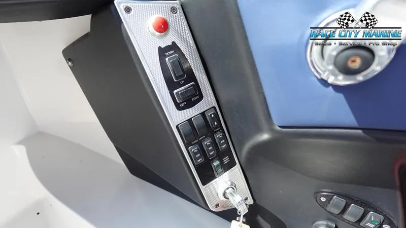 Slide: The Image of Control panel of 2015 MasterCraft X55 boat with Race City Marine logo. - 26