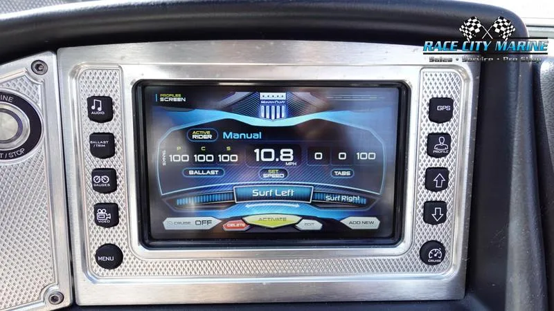 Slide: The Image of MasterCraft X55 2015 dashboard display with surf settings and controls. - 29