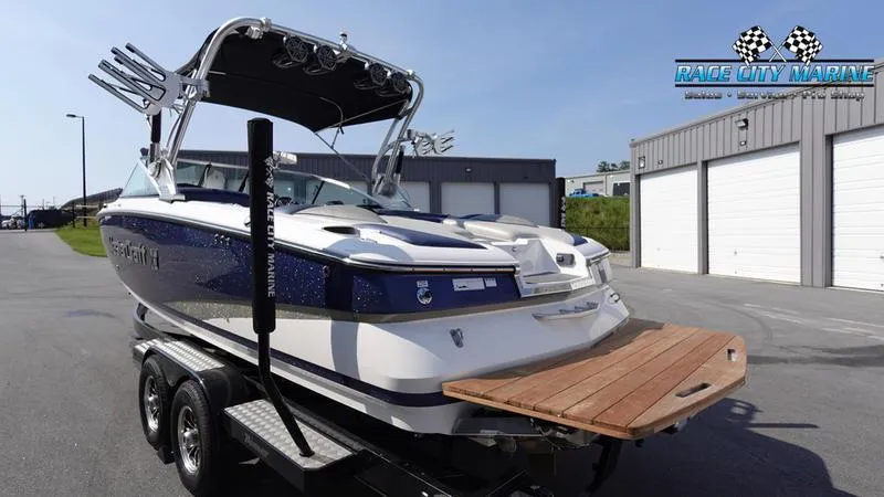 Slide: The Image of 2015 MasterCraft X55 boat on trailer at Race City Marine dealership. - 3
