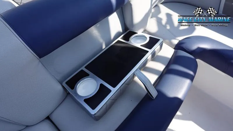 Slide: The Image of 2015 MasterCraft X55 boat interior with cup holders and seating. - 42