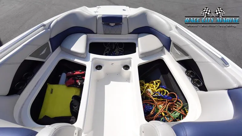 Slide: The Image of 2015 MasterCraft X55 boat interior with storage compartments and accessories. - 45