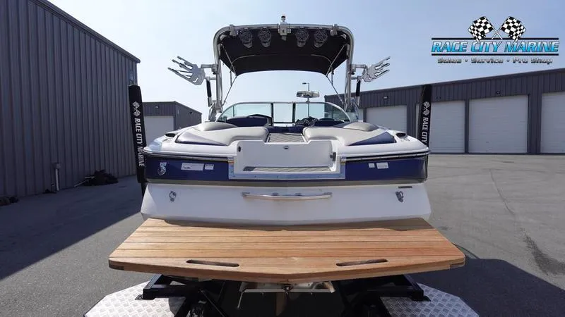 Slide: The Image of 2015 MasterCraft X55 boat with wooden deck at Race City Marine. - 7